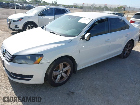 2014 Volkswagen Passat Wolfsburg Edition with VIN 1VWAS7A30EC053025, listed as a IAAI auction lot 42579059 with 168,446 mi miles and . Bid and sale history available at DreamBid. Image 2.