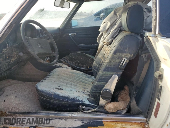 1980 Mercedes-Benz SL with VIN 10704412062529, listed as a Copart auction lot 77941784 with Not provided miles and Salvage title. Bid and sale history available at DreamBid. Image 7.