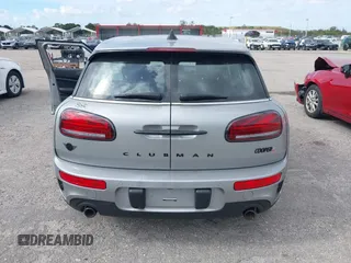 2023 MINI Clubman Cooper S with VIN WMWXJ1C03P2U08484, listed as a IAAI auction lot 41056651 with 12,948 mi miles. Bid and sale history available at carsss.com. Image 16.