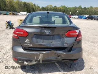 2016 Ford Focus SE z VIN 1FADP3F23GL355587, wystawiony jako Copart lot #53462345 z przebiegiem 101 628 mil mil oraz Szkoda całkowita • Salvage title. Historia ofert i sprzedaży dostępna na DreamBid. Obrazek 6.