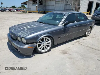 2004 Jaguar XJ with VIN SAJWA73B64TG18784, listed as a Copart auction lot 81254734 with 0 mi miles and Clean Title. Bid and sale history available at carsss.com. Image 1.