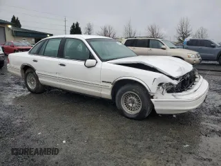 1995 Ford Crown Victoria LX с VIN 2FALP74W1SX200511, выставлен на аукционе Copart как лот 48807055 с пробегом 62 133 миль миль и Списание • Salvage title. История ставок и продаж доступна на DreamBid. Изображение 4.