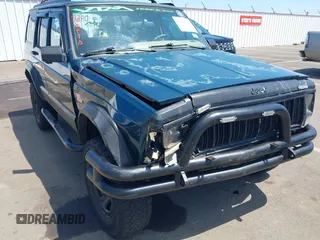 1995 Jeep Cherokee Sport with VIN 1J4FJ68S7SL631078, listed as a IAAI auction lot 42408148 with 190,765 mi miles and . Bid and sale history available at DreamBid. Image 6.