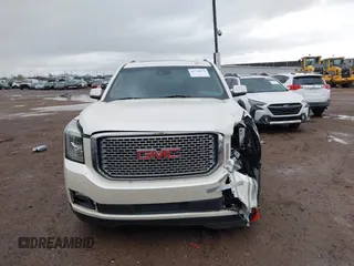 2015 GMC Yukon XL Denali with VIN 1GKS2JKJ2FR590502, listed as a IAAI auction lot 41758575 with 129,777 mi miles. Bid and sale history available at carsss.com. Image 11.