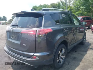 2018 Toyota RAV4 XLE with VIN JTMWFREV7JD111785, listed as a IAAI auction lot 42583535 with 110,724 mi miles and . Bid and sale history available at DreamBid. Image 4.