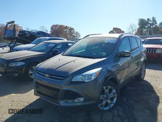 2014 Ford Escape Titanium with VIN 1FMCU9J94EUC50534, listed as a IAAI auction lot 41040341 with 115,502 mi miles. Bid and sale history available at carsss.com. Image 16.