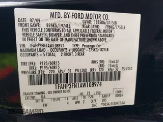2010 Ford Focus SE with VIN 1FAHP3FN1AW108974, listed as a IAAI auction lot 41208950 with 146,536 mi miles. Bid and sale history available at carsss.com. Image 9.