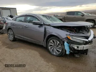 2020 Honda Insight Touring with VIN 19XZE4F96LE011148, listed as a Copart auction lot 83829734 with 64,488 mi miles and Salvage Title. Bid and sale history available at carsss.com. Image 4.