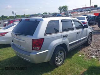 2006 Jeep Grand Cherokee Laredo with VIN 1J4GS48K56C260532, listed as a IAAI auction lot 42607110 with 153,110 mi miles and . Bid and sale history available at DreamBid. Image 4.