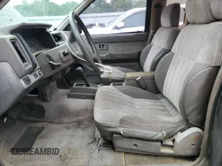 1990 Nissan Hardbody with VIN 1N6HD16SXLC327964, listed as a Copart auction lot 55984175 with 241,289 mi miles and Clean Title. Bid and sale history available at DreamBid. Image 7.