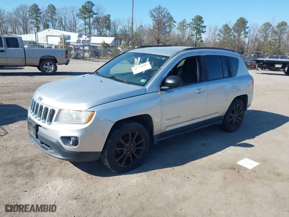 2012 Jeep Compass Latitude with VIN 1C4NJDEB4CD676310, listed as a IAAI auction lot 41714804 with 162,086 mi miles. Bid and sale history available at carsss.com. Image 2.