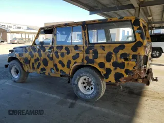 1974 Toyota Land Cruiser z VIN FJ5546419, wystawiony jako Copart lot #48010795 z przebiegiem 85 596 mil mil oraz Czysty tytuł • Clean title. Historia ofert i sprzedaży dostępna na DreamBid. Obrazek 2.