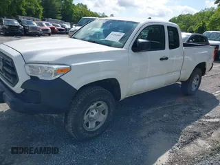 2019 Toyota Tacoma SR z VIN 5TFSX5EN1KX067514, wystawiony jako IAAI lot #42264001 z przebiegiem 179 048 mil mil oraz . Historia ofert i sprzedaży dostępna na DreamBid. Obrazek 2.