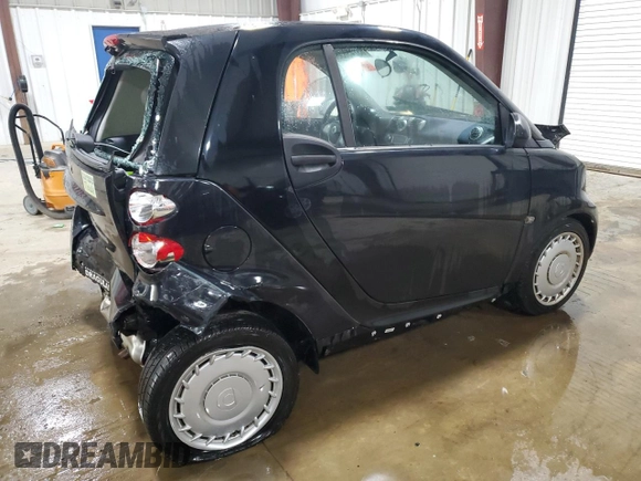 2015 Smart fortwo Passion с VIN WMEEJ3BA6FK820446, выставлен на аукционе Copart как лот 63243635 с пробегом Не указан миль и Списание • Salvage title. История ставок и продаж доступна на DreamBid. Изображение 3.