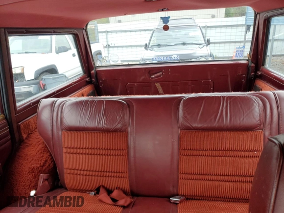 1986 Jeep Grand Wagoneer z VIN 1JCNJ15U6GT029563, wystawiony jako Copart lot #78917364 z przebiegiem 115 025 mil mil oraz Szkoda całkowita • Salvage title. Historia ofert i sprzedaży dostępna na DreamBid. Obrazek 10.