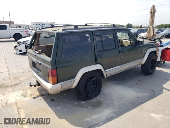 1995 Jeep Cherokee Country with VIN 1J4FJ78S4SL631318, listed as a Copart auction lot 63087634 with 295,577 mi miles and Salvage Title. Bid and sale history available at carsss.com. Image 3.