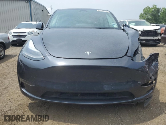 2024 Tesla Model Y Long Range z VIN 7SAYGDEE2RF986871, wystawiony jako Copart lot #60168535 z przebiegiem 15 647 mil mil oraz Szkoda całkowita • Salvage title. Historia ofert i sprzedaży dostępna na DreamBid. Obrazek 5.
