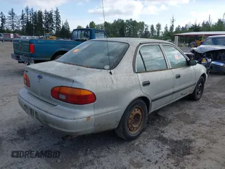 1999 Chevrolet Prizm z VIN 1Y1SK5281XZ427093, wystawiony jako IAAI lot #42251187 z przebiegiem 265 955 mil mil oraz . Historia ofert i sprzedaży dostępna na DreamBid. Obrazek 4.