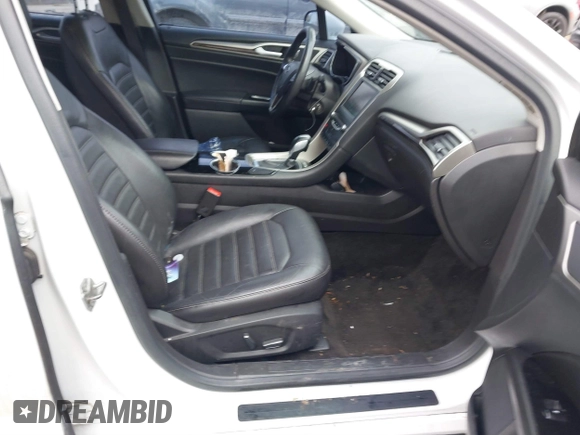 2015 Ford Fusion SE with VIN 3FA6P0H9XFR181132, listed as a IAAI auction lot 41075635 with 216,089 mi miles and . Bid and sale history available at DreamBid. Image 5.