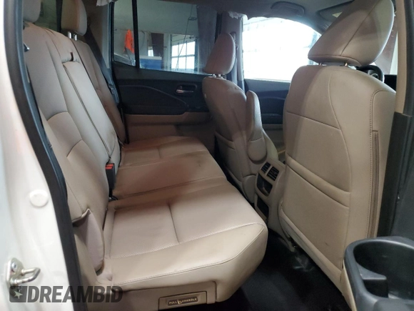 2017 Honda Ridgeline RTL-E with VIN 5FPYK3F72HB002890, listed as a Copart auction lot 57699735 with 128,813 mi miles and Salvage title. Bid and sale history available at DreamBid. Image 10.