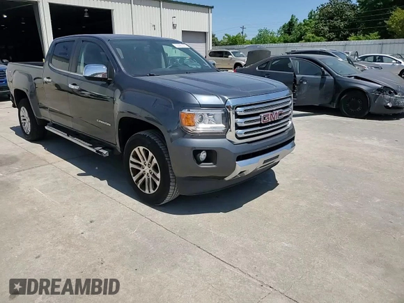2015 GMC Canyon 4WD SLT z VIN 1GTG6CE30F1182562, wystawiony jako Copart lot #55382605 z przebiegiem 97 183 mil mil oraz Szkoda całkowita • Salvage title. Historia ofert i sprzedaży dostępna na DreamBid. Obrazek 13.