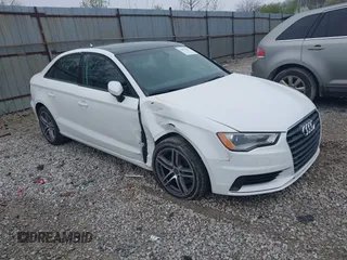 2016 Audi A3 2.0T Premium with VIN WAUB8GFF5G1052957, listed as a IAAI auction lot 41953265 with 121,407 mi miles. Bid and sale history available at carsss.com. Image 1.