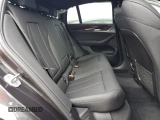 2021 BMW X4 M40i z VIN 5UX2V5C0XM9F04867, wystawiony jako Copart lot #57890555 z przebiegiem 40 563 mil mil oraz Szkoda całkowita • Salvage title. Historia ofert i sprzedaży dostępna na DreamBid. Obrazek 11.