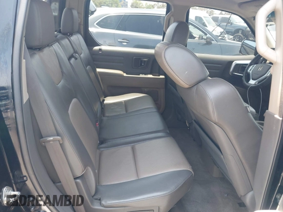 2006 Honda Ridgeline RTL with VIN 2HJYK16576H566002, listed as a IAAI auction lot 42595698 with 212,637 mi miles and . Bid and sale history available at DreamBid. Image 8.