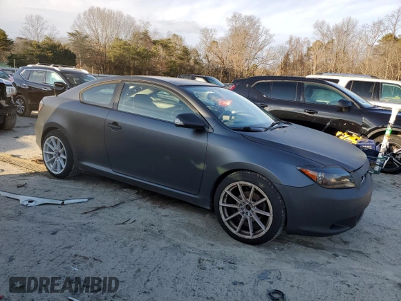 2005 Scion tC with VIN JTKDE177850037762, listed as a Copart auction lot 86132014 with 165,009 mi miles and Salvage Title. Bid and sale history available at carsss.com. Image 4.