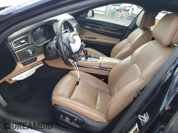 2015 BMW 7 Series 750i xDrive with VIN WBAYB6C58FD966084, listed as a Copart auction lot 61875325 with 159,616 mi miles and Salvage title. Bid and sale history available at DreamBid. Image 7.
