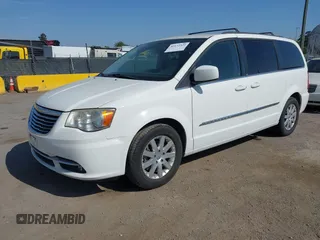 2013 Chrysler Town & Country Touring with VIN 2C4RC1BG4DR610462, listed as a IAAI auction lot 42173321 with 73,397 mi miles. Bid and sale history available at carsss.com. Image 2.