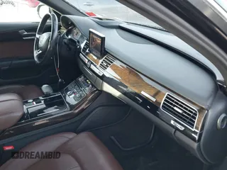 2015 Audi A8 L 4.0T with VIN WAU32AFD0FN035282, listed as a IAAI auction lot 41515136 with 76,518 mi miles. Bid and sale history available at carsss.com. Image 5.