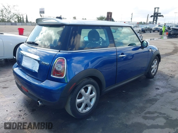 2009 MINI Hardtop with VIN WMWMF335X9TW71208, listed as a IAAI auction lot 41535653 with 148,660 mi miles and . Bid and sale history available at DreamBid. Image 4.