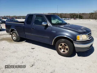 2000 Ford F-150 XL with VIN 1FTZX1725YNC28381, listed as a Copart auction lot 50144275 with 0 mi miles and Non Repairable. Bid and sale history available at carsss.com. Image 4.