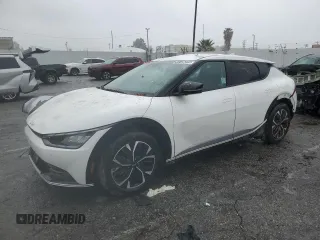2024 Kia EV6 Wind with VIN KNDC3DLC8R5614005, listed as a Copart auction lot 44126225 with 7,290 mi miles and Salvage Title. Bid and sale history available at carsss.com. Image 1.