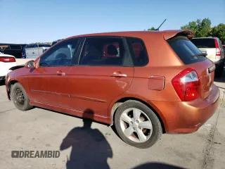 2007 Kia Spectra with VIN KNAFE162X75009714, listed as a Copart auction lot 69094894 with 206,173 mi miles and Salvage Title. Bid and sale history available at carsss.com. Image 2.