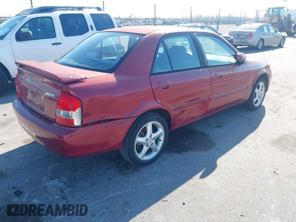 2001 Mazda Protege LX with VIN JM1BJ226310453078, listed as a IAAI auction lot 41683416 with 78,228 mi miles and . Bid and sale history available at DreamBid. Image 4.