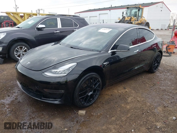 2018 Tesla Model 3 Long Range Battery z VIN 5YJ3E1EA7JF035546, wystawiony jako IAAI lot #42064239 z przebiegiem 113 210 mil mil oraz . Historia ofert i sprzedaży dostępna na DreamBid. Obrazek 19.