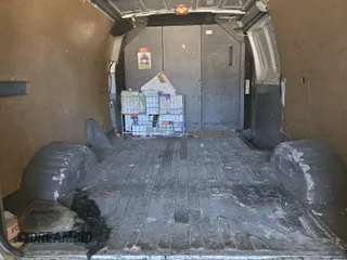 2010 Ford Econoline Cargo Commercial with VIN 1FTNE1EW4ADA91052, listed as a IAAI auction lot 42607935 with 163,519 mi miles and . Bid and sale history available at DreamBid. Image 16.