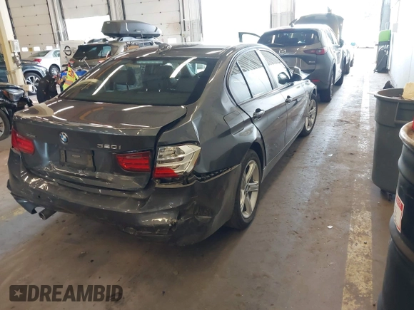 2015 BMW 3 Series 320i xDrive with VIN WBA3C3C5XFP664591, listed as a IAAI auction lot 42140108 with 81,064 mi miles and . Bid and sale history available at DreamBid. Image 4.