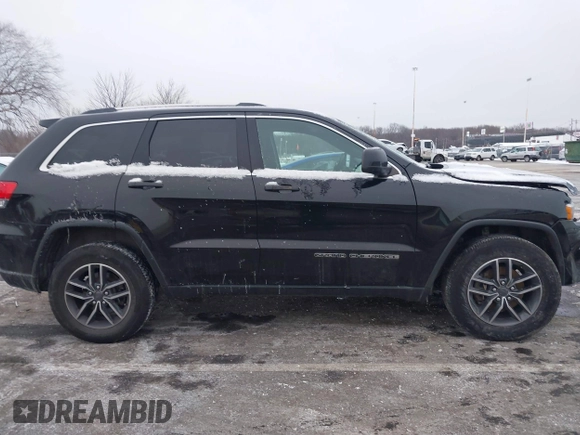 2019 Jeep Grand Cherokee Laredo E with VIN 1C4RJFAGXKC834233, listed as a IAAI auction lot 41392437 with 81,005 mi miles. Bid and sale history available at carsss.com. Image 14.