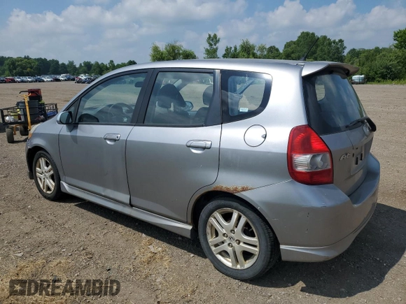 2007 Honda Fit Sport with VIN JHMGD38687S067648, listed as a Copart auction lot 64657345 with 123,055 mi miles and Salvage title. Bid and sale history available at DreamBid. Image 2.