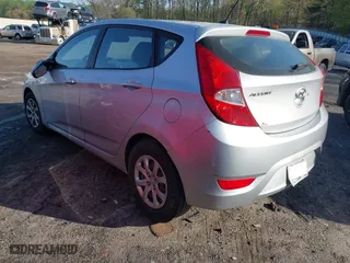 2014 Hyundai Accent GS with VIN KMHCT5AE4EU159319, listed as a IAAI auction lot 41896989 with 204,453 mi miles. Bid and sale history available at carsss.com. Image 3.