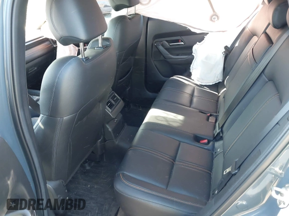 2023 Mazda CX-50 S Premium Plus with VIN 7MMVABEM8PN108020, listed as a IAAI auction lot 42203568 with 26,783 mi miles and . Bid and sale history available at DreamBid. Image 8.
