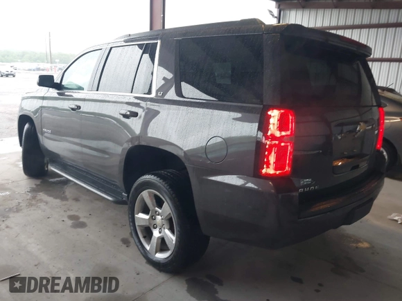 2017 Chevrolet Tahoe LT with VIN 1GNSKBKC8HR326004, listed as a IAAI auction lot 42256494 with 101,486 mi miles and . Bid and sale history available at DreamBid. Image 3.