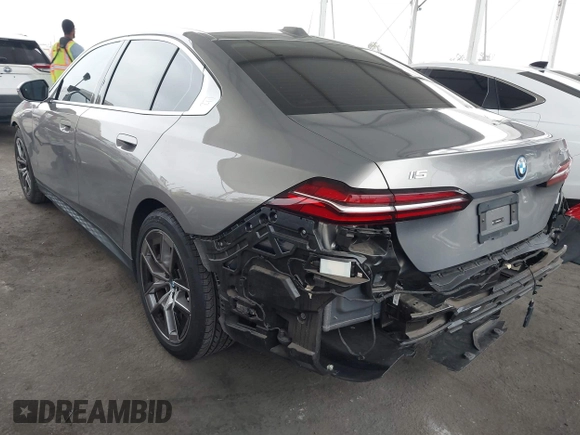 2024 BMW i5 eDrive40 with VIN WBY33FK06RCR97424, listed as a IAAI auction lot 42173284 with 18,645 mi miles and . Bid and sale history available at DreamBid. Image 3.