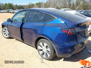 2023 Tesla Model Y Long Range with VIN 7SAYGDEE6PF847890, listed as a IAAI auction lot 41635687 with 32,846 mi miles and . Bid and sale history available at DreamBid. Image 3.