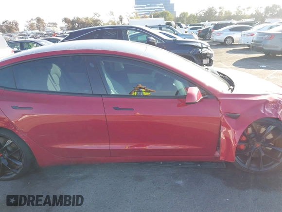 2021 Tesla Model 3 Performance with VIN 5YJ3E1EC9MF926301, listed as a IAAI auction lot 40959721 with 28,094 mi miles and . Bid and sale history available at DreamBid. Image 13.
