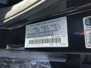 2016 Mazda 3 i Sport with VIN JM1BM1U79G1314101, listed as a IAAI auction lot 41394947 with 92,508 mi miles and . Bid and sale history available at DreamBid. Image 9.