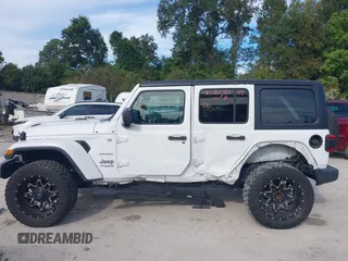 2018 Jeep Wrangler Unlimited Sahara z VIN 1C4HJXEG4JW220092, wystawiony jako IAAI lot #40522478 z przebiegiem 90 529 mil mil oraz . Historia ofert i sprzedaży dostępna na DreamBid. Obrazek 14.